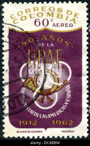 Eine Briefmarke gedruckt in Kolumbien, gewidmet den 50. Jahrestag der Gründung des Postal Union of the Americas und Spanien Stockfoto