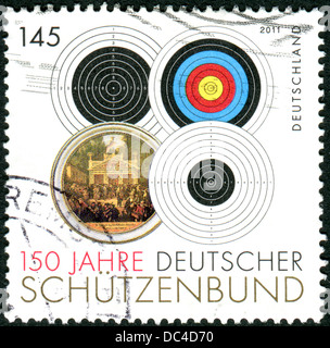 Briefmarken gedruckt in Deutschland, gewidmet den 150. Jahrestag des Verbands Deutscher Shooting Stockfoto