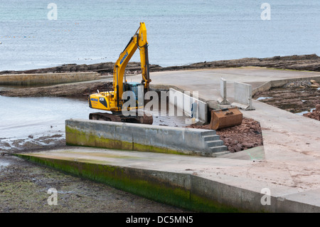 Arbeiten Sie an der Anlegestelle in Newark Bay, Deerness, Orkney. Stockfoto