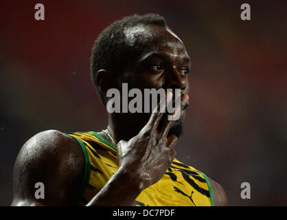 Moskau, Russland. 11. August 2013. Usain Bolt aus Jamaika gewinnt die Männer 100m-Finale bei den 14. Weltmeisterschaften im Luzhniki-Stadion in Moskau, Russland, 11. August 2013. Foto: Bernd Thissen/Dpa/Alamy Live News Stockfoto