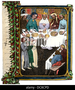 Königliches Bankett im frühen 15. Jahrhundert, von einem beleuchteten Manuskript. Hand - farbige Holzschnitt Reproduktion Stockfoto