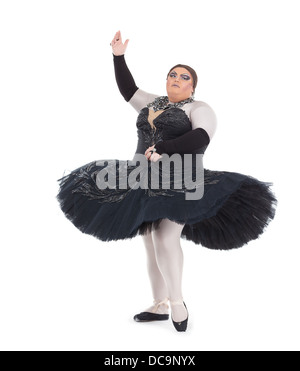 Übergewicht Drag Queen tanzen in einem Tutu flink balancieren auf Zehenspitzen mit seinen Fuß in eine lustige Karikatur eines weiblichen Balletts Stockfoto