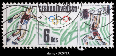 Stempel von der Tschechoslowakei gedruckt, zeigt Olympics, Tischtennis, Gewichtheben, ca. 1988 Stockfoto