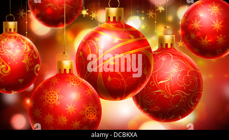 Weihnachten rot/gelb abstrakten Hintergrund mit verziert große rote Kugeln im Vordergrund. Stockfoto
