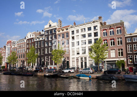 Historischen Reihenhäuser am Singel-Kanal in Amsterdam, Holland, Niederlande. Stockfoto