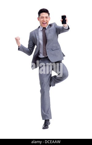 Glücklich Kaufmann mit Handy Stockfoto