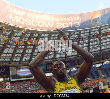 Moskau, Russland. 17. August 2013. Usain Bolt aus Jamaika feiert nach dem Sieg der Herren 200m Finale bei den 14. Weltmeisterschaften in der Leichtathletik im Luzhniki-Stadion in Moskau, Russland, 17. August 2013. Foto: Bernd Thissen/Dpa/Alamy Live News Stockfoto