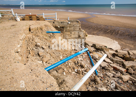 Zertrümmerte konkrete Küstenschutzes am Strand Bank Caravan Park in Ulrome in der Nähe von Skipsea Stockfoto