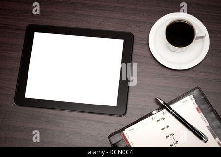 leere Tablet und einer Tasse Kaffee auf dem Schreibtisch Stockfoto