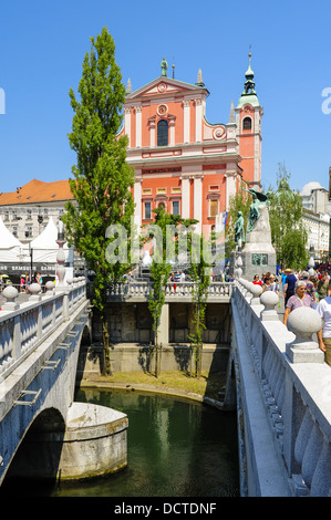 Ljubljana, Franziskanerkirche, Mariä Verkündigungskirche Cerkev Marijinega Oznanjenja, Drachenbrücke, Drei Brücken, Slowenien Stockfoto