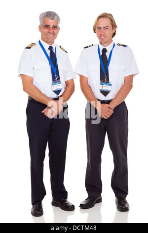 fröhlichen senior Flugkapitän und der erste Offizier auf weißem Hintergrund Stockfoto