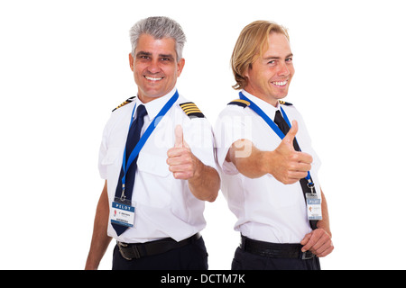glücklich Airline Piloten gebende Daumen oben isoliert auf weiss Stockfoto