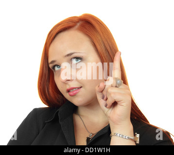 Charmante Geschäftsfrau nach oben zeigend, auf weißen Hintergrund isoliert. Stockfoto