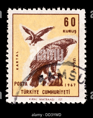 Briefmarke aus der Türkei mit einem goldenen Adler Stockfoto