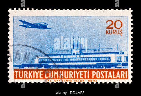 Briefmarke aus der Türkei darstellt, ein Flugzeug und Yesilkoy Flughafen. Stockfoto