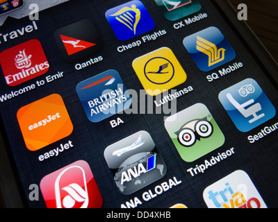 Detail von vielen Reise- und Airline apps auf ein iPhone 5 Smartphone Stockfoto