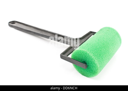 Kleine grüne Farbroller isoliert auf weiss Stockfoto
