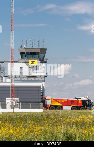 Deutschland, Laupheim, View of Fire Truck und Aerodrome Control Tower Stockfoto