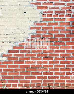 Einem alten roten Backsteinmauer. Kann als Hintergrund verwendet werden. Stockfoto