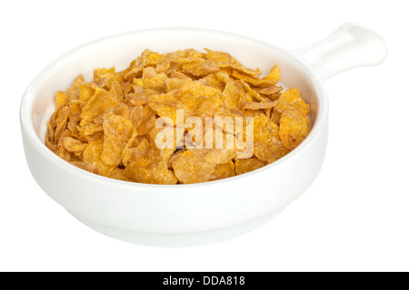 Cornflakes - eine Schüssel Cornflakes, isoliert auf weiß, von vorne nach hinten Fokus, Clipping-Pfad. Stockfoto