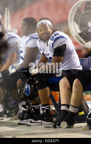 31. August 2013 - San Diego, CA, Vereinigte Staaten von Amerika - Eastern Illinois Panthers defensive Lineman Clinton Simpkins (96) bekommen etwas Entlastung von den Fans in der San Diego-Hitze. Die San Diego State Azteken fiel zu den Ostern Illinois Panthers mit einem Score von 40-19. Stockfoto