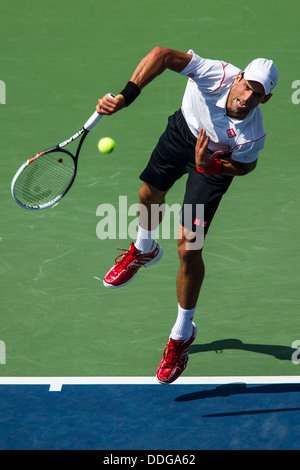 Novak Djokovic (SRB) im Wettbewerb um die 2013 US Open Tennis Championships. Stockfoto