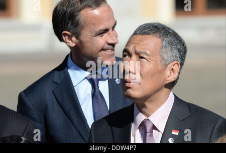 St. Petersburg, Russland. 6. September 2013. Premierminister von der Republik von Singapur Lee Hsien Loong, rechts, Lehrstuhl für die finanzielle Stabilität Board Mark Carney an der offiziellen Gruppe-Foto-Session auf Staats-und Regierungschefs der G20-Gipfel in St. Petersburg, Russland am 6. September 2013. : Obligatorisch Host Foto Auskunftei über CNP Credit: Dpa picture-Alliance/Alamy Live News Stockfoto