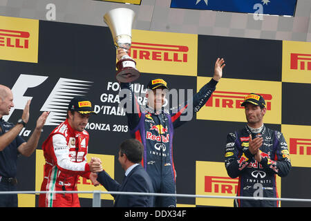 Motorsport: FIA Formel 1 Weltmeisterschaft 2013, Grand Prix von Italien, #3 Fernando Alonso (ESP, Scuderia Ferrari), #1 Sebastian Vettel (GER, Infiniti Red Bull Racing), #2 Mark Webber (AUS, Infiniti Red Bull Racing), Stockfoto