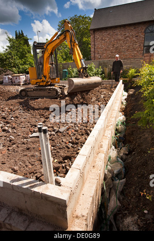 Selbstbau-Haus, Website, JCB Bagger Bodenplatte Basis vorbereiten Vorbereitung Stockfoto