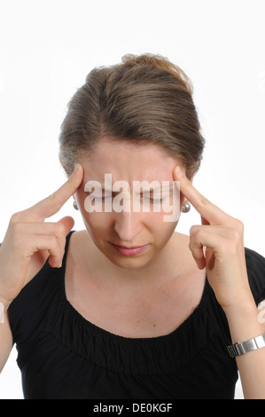 Junge Frau, die unter Kopfschmerzen leiden Stockfoto