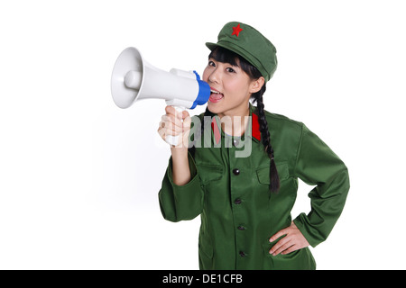Junge Frau in uniform Stockfoto