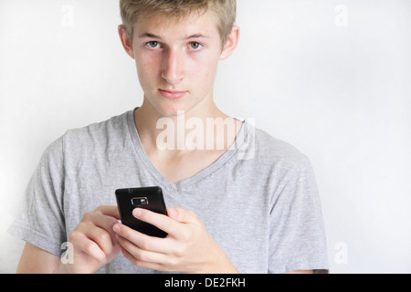 Teenager mit einem smartphone Stockfoto
