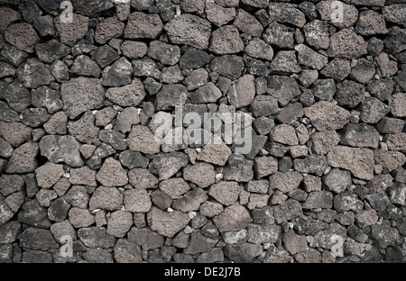 Trockenmauer besteht aus individuell gestapelt Lavafelsen, typisches Merkmal von Lanzarote, Lanzarote, Kanarische Inseln, Spanien Stockfoto