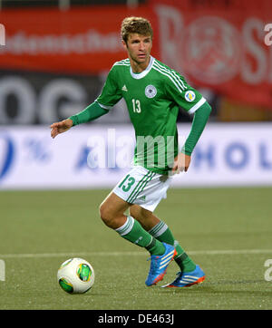 Tórshavn, Färöer. 10. September 2013. Deutschlands Thomas Mueller während der FIFA WM 2014 Qualifikation Gruppe C Fußball-match zwischen Färöer und Deutschland im Torsvollur Stadion in Tórshavn, Färöer, 10. September 2013. Foto: Thomas Eisenhuth/Dpa/Alamy Live News Stockfoto