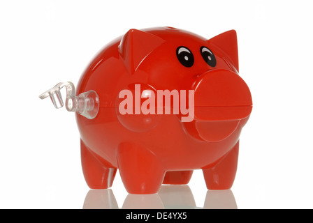 Sparschwein mit ein Ventil öffnen, symbolisches Bild für Banken, die Luft ausgeht Stockfoto