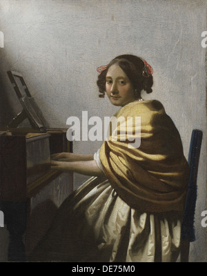 Eine junge Frau am Virginal, c. 1670 sitzen. Künstler: Vermeer, Jan (Johannes) (1632-1675) Stockfoto