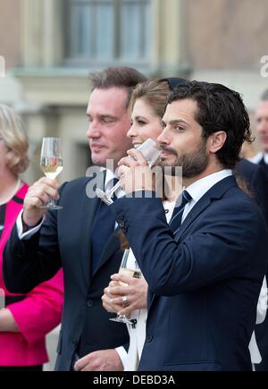 Stockholm, Schweden. 15. September 2013. Christopher O'Neill, Prinz Carl Philip und Prinzessin Madeleine nimmt an der Eröffnung der Tanz-Feier der Stadt Stockholm im Zusammenhang mit König Carl Gustaf 40-jähriges Jubiläum auf dem Innenhof des königlichen Palastes in Stockholm, Schweden, 15. September 2013. Foto: Foto: RPE / Albert Nieboer --/ Dpa/Alamy Live News Stockfoto