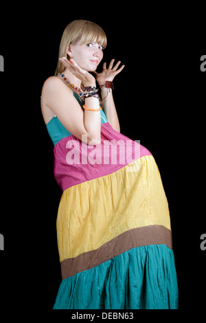 Die junge Schönheit Frau in einem Kleid. Isoliert. Lustiges Bild Stockfoto