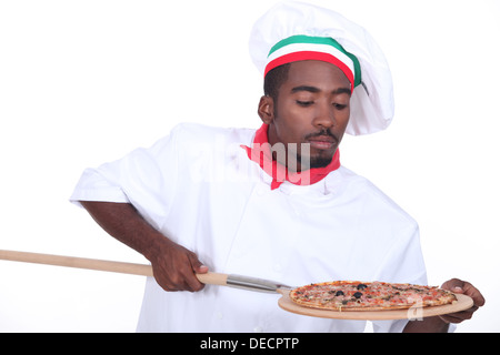 Mann mit pizza Stockfoto