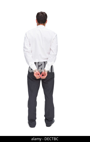 Rückansicht des jungen Geschäftsmann tragen Handschellen Stockfoto