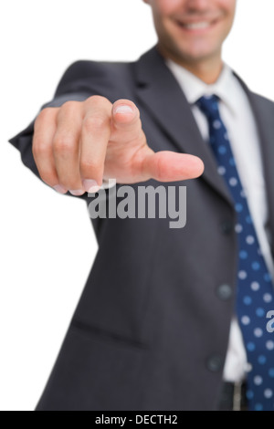 Finger des lächelnden Geschäftsmann zeigen Stockfoto
