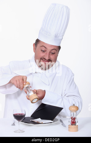 Koch würzen die Rechnung Stockfoto