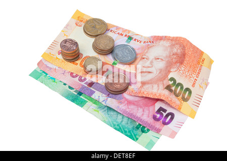 Stapel von Münzen auf drei South African Banknoten Stockfoto