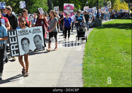 London, Ontario, Kanada. 24. September 2013. Ein Protest fordert die ägyptische Regierung freizugebende 2 kanadische Staatsbürger, die in Haft gehalten. Am 16 August Notaufnahme Arzt Tarek Loubani und Filmemacher John Greyson in Kairo verhaftet wurden, während der Reise durch Ägypten in den Gazastreifen, hat keinen Grund für ihre Inhaftierung gegeben. Bildnachweis: Jonny White/Alamy Live-Nachrichten Stockfoto