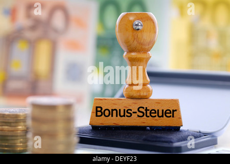 Stempel mit dem Schriftzug "Bonus-Steuer", Bonus-Steuer Stockfoto