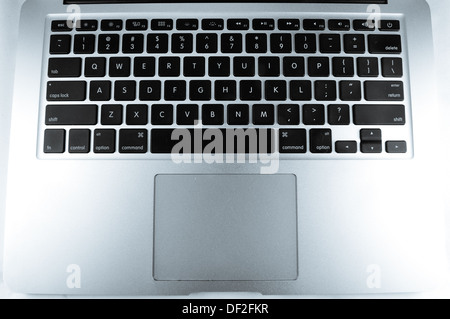 MacBook Air in verschiedenen Silhouette, Tastatur und Seite. Stockfoto