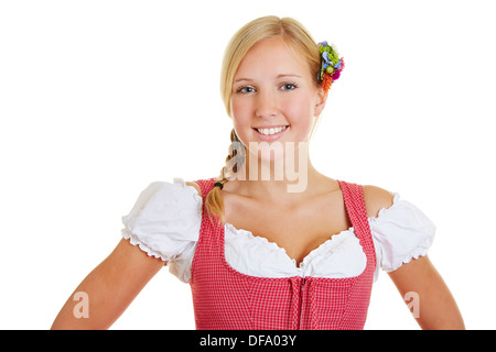 Porträt einer jungen blonden lächelnden Frau im dirndl Stockfoto