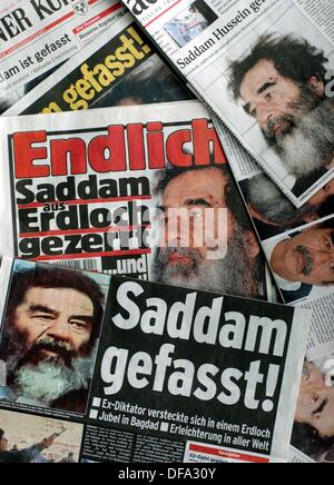 Irakische ehemaligen Diktators Saddam Verhaftung beherrscht die Schlagzeilen der Zeitungen am 15. Dezember 2003. Stockfoto