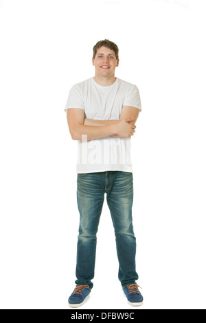 Lächelnder junge Mann mit Arme gekreuzt Stockfoto