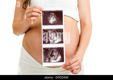 Schwangere Frau mit Ultraschall auf ihrem Bauch Stockfoto